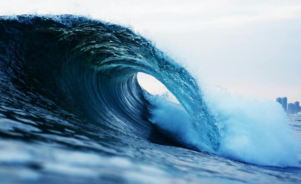 photography of barrel wave