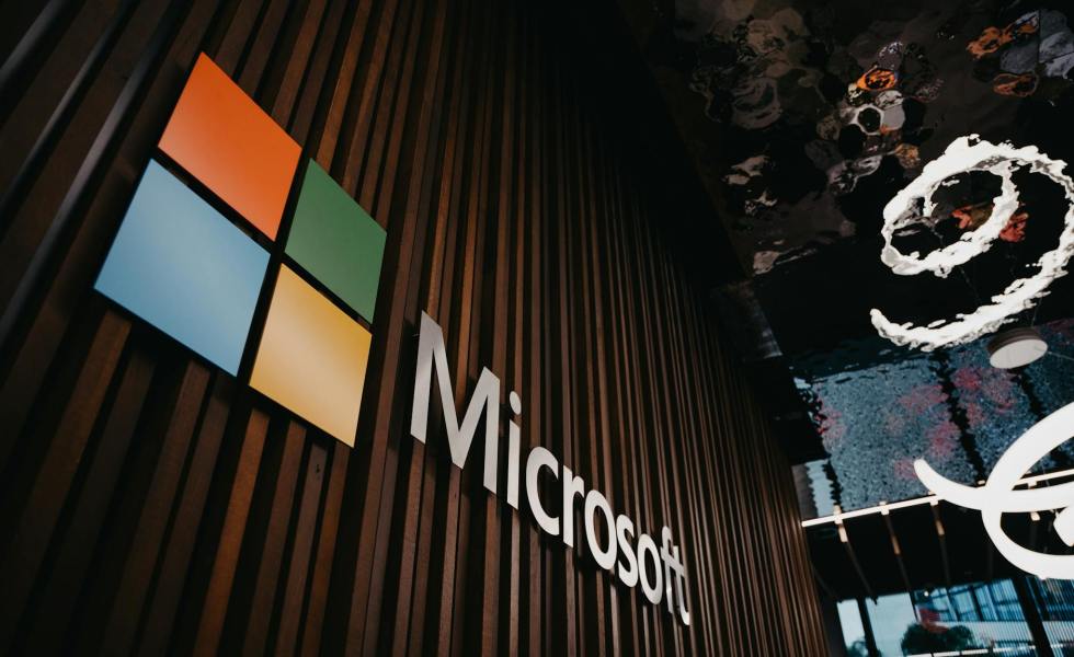 a company logo on a wall