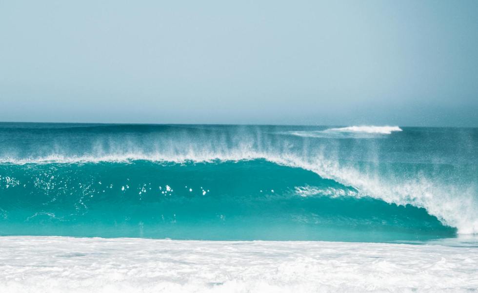 stormy azure sea with foamy wave