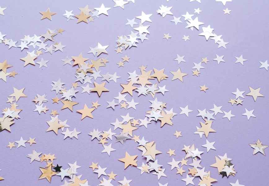 stars on pastel purple surface