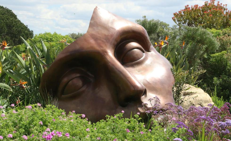 brown man face figurine